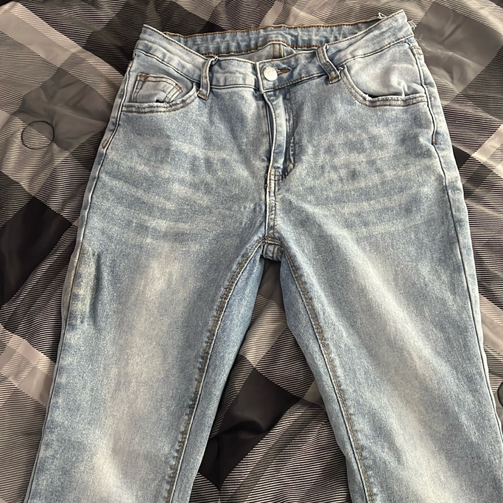 Women’s distressed slim fit flare leg jeans